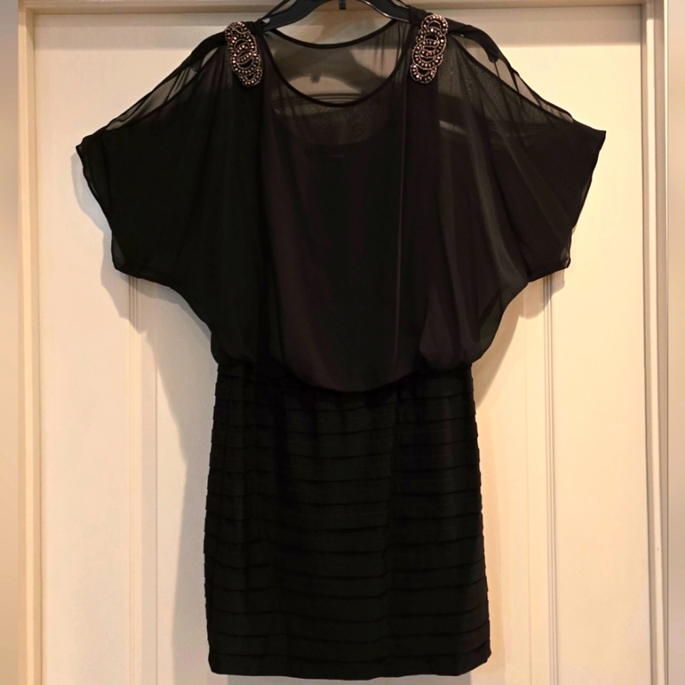 Elegant Black Dress with Embellished Shoulders